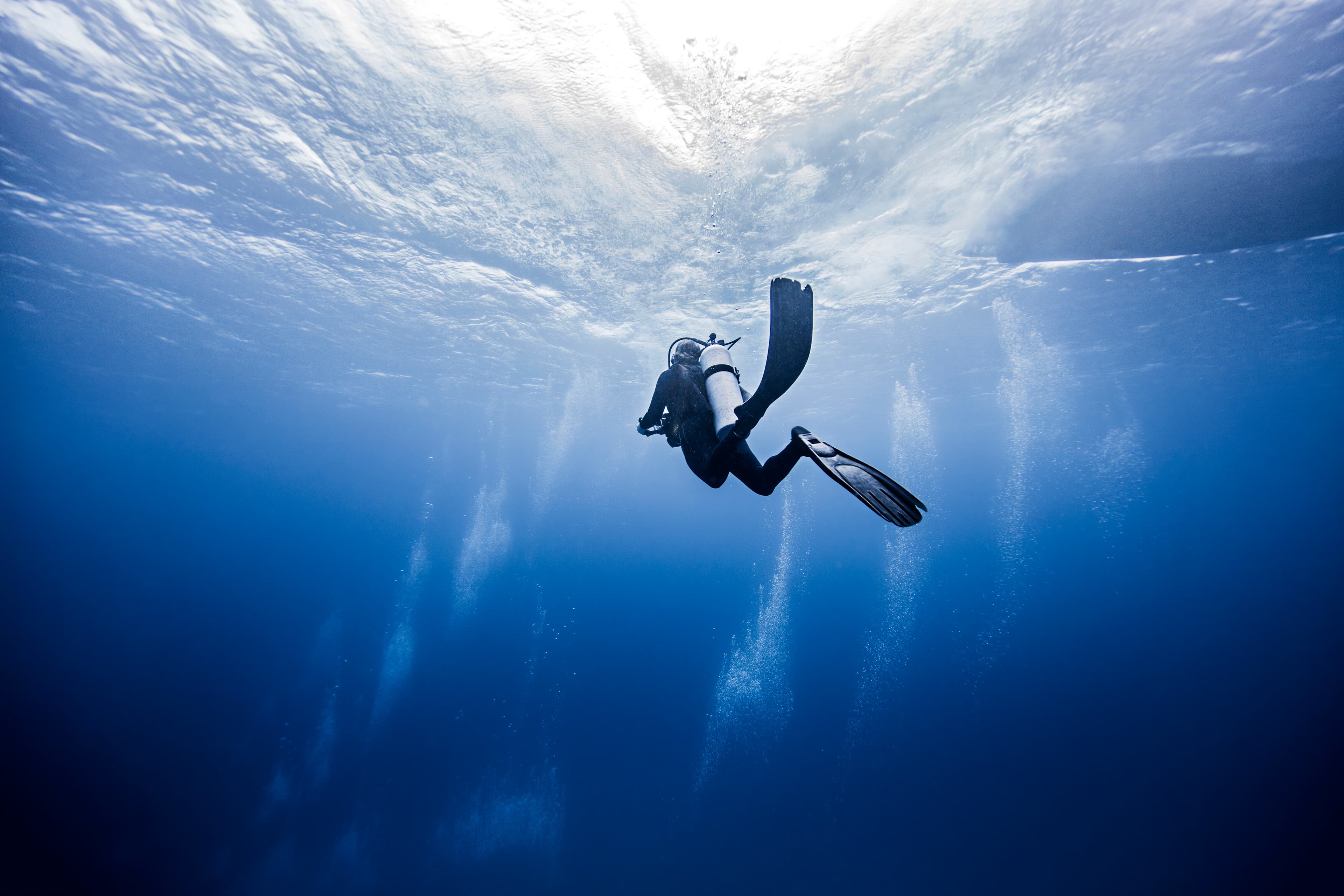 Scuba diver in crystal clear water